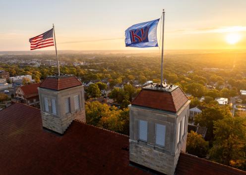 KU and American flag above Fraser Hall